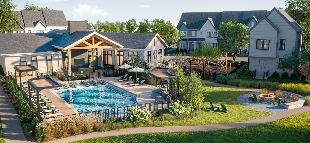 a pool and courtyard at sunset